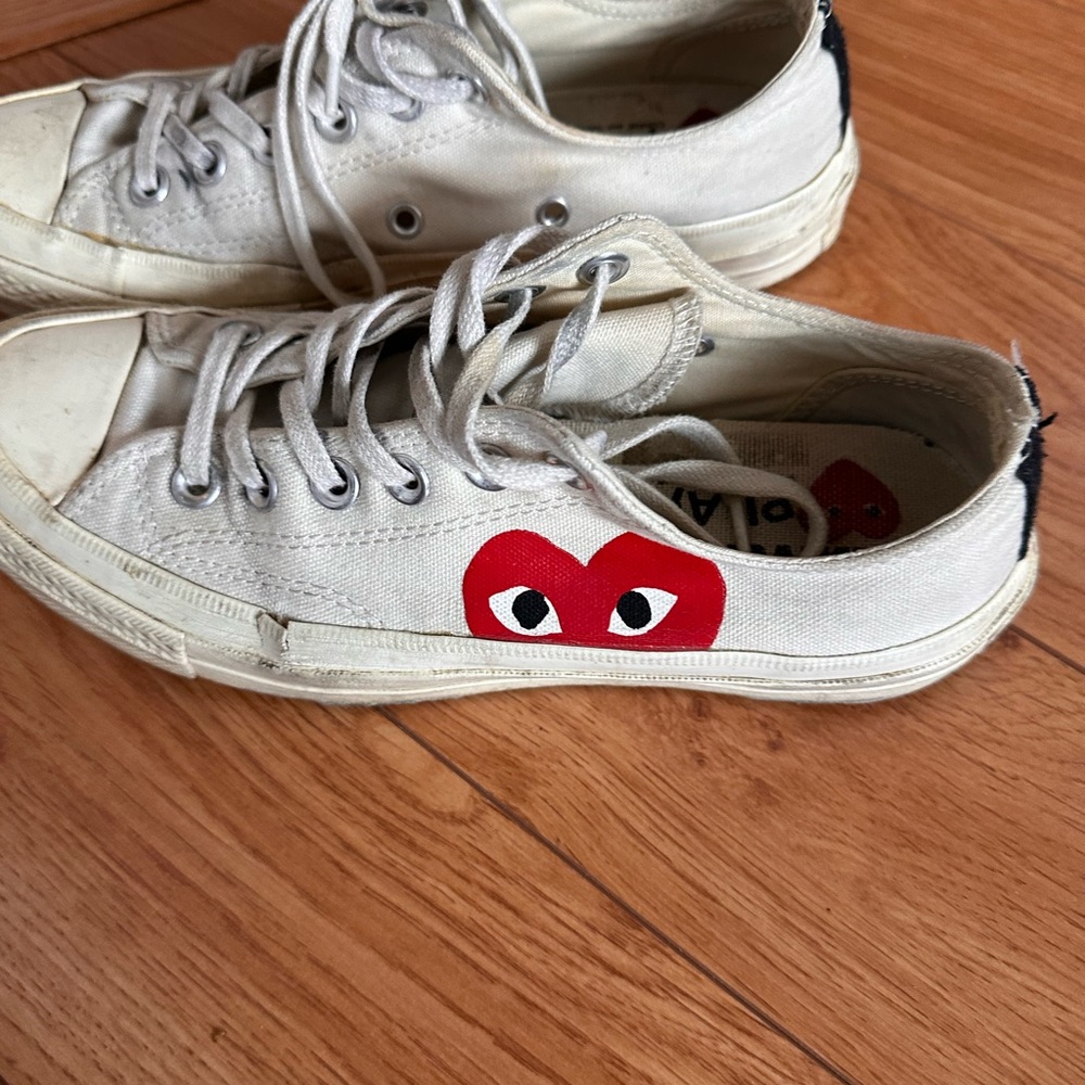 Well worn Comme Des Garçon low top converse